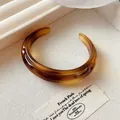 Amber marbled resin open cuff bracelet with irregular geometric chunky design for women - Style 30