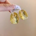 Orecchini a perno ovali dorati martellati irregolari dal design minimalista elegante - Perno Ovale Martellato Irregolare (47#) / Oro