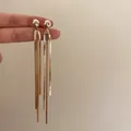 Eleganti orecchini lunghi a nappa dorati con perno a sfera liscia e catene a serpente - Nappina a Sfera Oro (12#)