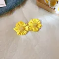 Detailed close-up view of yellow daisy flower stud earrings with delicate petal textures - 31# Silver Earring Post-Yellow