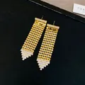 Eleganti orecchini a nappa lunghi in oro con accenti di zirconi in design di lusso. - Paillettes Oro Placcate Oro Vero (45#)