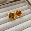 Detailed view of vintage Maillard brown square stud earrings in a velvet tray - Round (2#) / Silver Needle / Gold/Brown