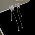 Eleganti orecchini a farfalla in argento con lunghe nappe e cristalli a forma di goccia - Stile Farfalla Nappina