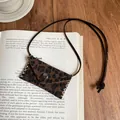 Close-up of retro Maillard style leopard print leather mini pouch pendant necklace - Square / Dark Coffee