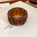 Detailed view of amber tortoiseshell marbled resin chunky link bracelet on fabric - Dark Coffee (23#)
