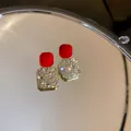 Elegant square stud earrings featuring vibrant red enamel and sparkling pavé crystals - Enamel Square Rhinestone Studs (26) / Red