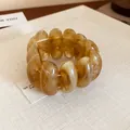 Elegant amber marbled resin bracelet with smooth oval beads in a chic minimalist style - Coffee (33#)