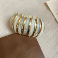 Elegant gold and white marbled elliptical stretch bracelet for women's fashion jewelry - White