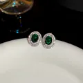 Macro view of vintage oval emerald-green resin stud earrings with double crystal halo - 38# Vintage Oval Surround Inlaid Style / Silver-Green