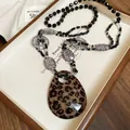 Collana lunga di perline in stile boho con un elegante ciondolo a goccia leopardato - Collana 68# - Nera - Stampa Leopardata