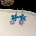 Elegant zircon floral drop earrings featuring blue marquise petals and shimmering crystals - Earring Hooks / Silver-Blue