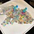 Orecchini pendenti vintage fatti a mano con nastro a pois rossi e conchiglie colorate - Blu misto