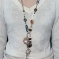 Close-up detail of Bohemian style necklace with woven flowers, beads and pearls on model. - 1# Style (HN9011)