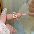 Bague ajourée élégante en or et argent bicolore avec motifs fleurs et zircons - Tournesol Bicolore Or et Argent (Plaqué Or Véritable)