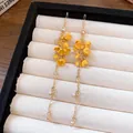 Elegante lange Quastenohrringe mit einem gelben Blumenstrauß und einer edlen Goldkettenoptik. - Blumen-Quastenstil (67#)