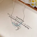 Elegant French vintage necklace with light blue beads and silver starburst pendant detail - Radial Star Pendant Style / 48# Necklace Silver Blue
