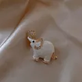 Elegant white enamel elephant brooch with sparkling gold-toned crystal accents for coats - Elephant Shape (HP390) / White