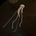 Elegant jellyfish brooch with pearl and rhinestone tassels on a black background - Rhinestone Artificial Pearl Tassel Style (HP390)