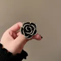 Vintage black rose brooch pin with sparkling rhinestone edges for elegant coat decoration - Black Rhinestone Flower Shape (HP390)