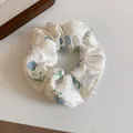 Elegant white fabric scrunchie featuring delicate blue flower prints for hair styling - Teal Floral Wrinkled Style (59#)