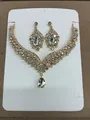 Elegant gold finish necklace and earring set with teardrop shaped sparkling rhinestones - Necklace-White
