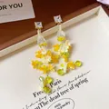 Mori-Stil gelbe Harzblumen Quastenohrringe mit Silbernadeln für den Strandurlaub - 34# Gelb Weiße Blume