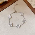 Elegant silver bracelet with five mother-of-pearl clover charms and crystal accents - Four-leaf Clover Style (42#) / Silver/White