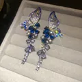 Detailed close-up of vintage butterfly earrings with gradient blue and purple zircons - 5# Blue-Purple Butterfly Long Tassel (Silver Post)