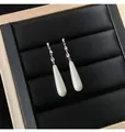 Élégantes boucles d'oreilles perles gouttes argent avec pierres de zircone - Tige en Argent 925 Style Goutte d'Eau / Argent
