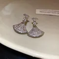 Detailed macro view of elegant silver fan-shaped earrings with sparkling zircon stones - 48# Silver Pave Fan-Shaped (Silver Post)