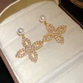 Elegant gold-finish zircon flower earrings with pearl accent in jewelry box. - Silver Post Flower Pearl (4#) / Gold