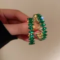 Eleganti orecchini a cerchio con pietre verdi taglio marquise e finitura dorata - Stile Strass Verde Marquise