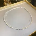 Detail shot of double-layered silver necklace with faceted metallic beads and fine chain. - 1# Double Layered Clavicle Chain