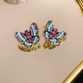 Élégantes boucles d'oreilles papillon dorées avec zircons multicolores scintillants - Style Papillon Pavé Coloré (37#)