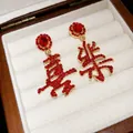 Orecchini rossi festivi con caratteri cinesi in una scatola regalo in legno di lusso - Stile Perno Argento - Carattere Xi Le (37#) / Rosso-Oro