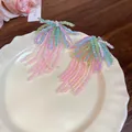 Vibrant dopamine style colorful beaded fringe drop earrings displayed on a cream plate. - Tassel Silver Post Style / Colorful