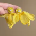 Close-up of yellow chiffon flower tassel earrings with sparkling zircon centers. - 1# Silver Post - Yellow Tassel Flower