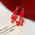 Macro view of festive red pony and Chinese character earrings with rhinestones details - 5# Gold Red