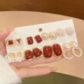 Close-up of elegant six-pair earring set featuring pearls and red enamel details - 2# Silver Post Style