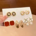Detailed close-up of a five-pair earring set featuring pearls and enamel oil drop finishes - 4# Silver Needle Style