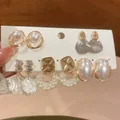 Set of five elegant French style pearl and gold-tone earrings displayed on a card. - 30# Silver Needle Style