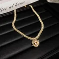 Collier vintage de style français avec pendentif fleur en perle et chaîne en cristal - Style Pendentif Fleur en Perle Strass