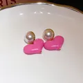 Detail of pink enamel heart earrings with elegant pearl studs and gold trim - Heart Round (14#) / Pink / Silver Needle