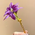 Close-up detail of a purple fabric flower hair fork with elegant golden U-shaped pin - Hair Stick Gold-Purple / Purple