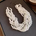 Close-up of multi-strand pearl necklace with rhinestone details and vintage design - Multi-Layer Pearl Knotted Style / White