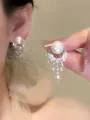 Detailed view of elegant French-style pearl earrings featuring sparkling silver-tone settings - Style 6 / Silver-White