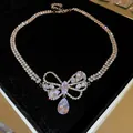 Collier argenté élégant doté d'un nœud en zircone scintillant et d'un pendentif en goutte - Collier / Argent