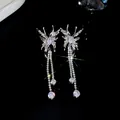Boucles d'oreilles papillon argentées exquises avec de longs pendentifs en zircon scintillant - Manchette d'Oreille Papillon / Argent