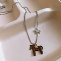 Minimalist silver ball chain necklace featuring detailed brown and silver horse pendants - Silver Ball Chain Double Horse Necklace (9#)