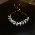 Detailed macro view of a sparkling zircon leaf bracelet with adjustable chain - Leaf Style (1#)
